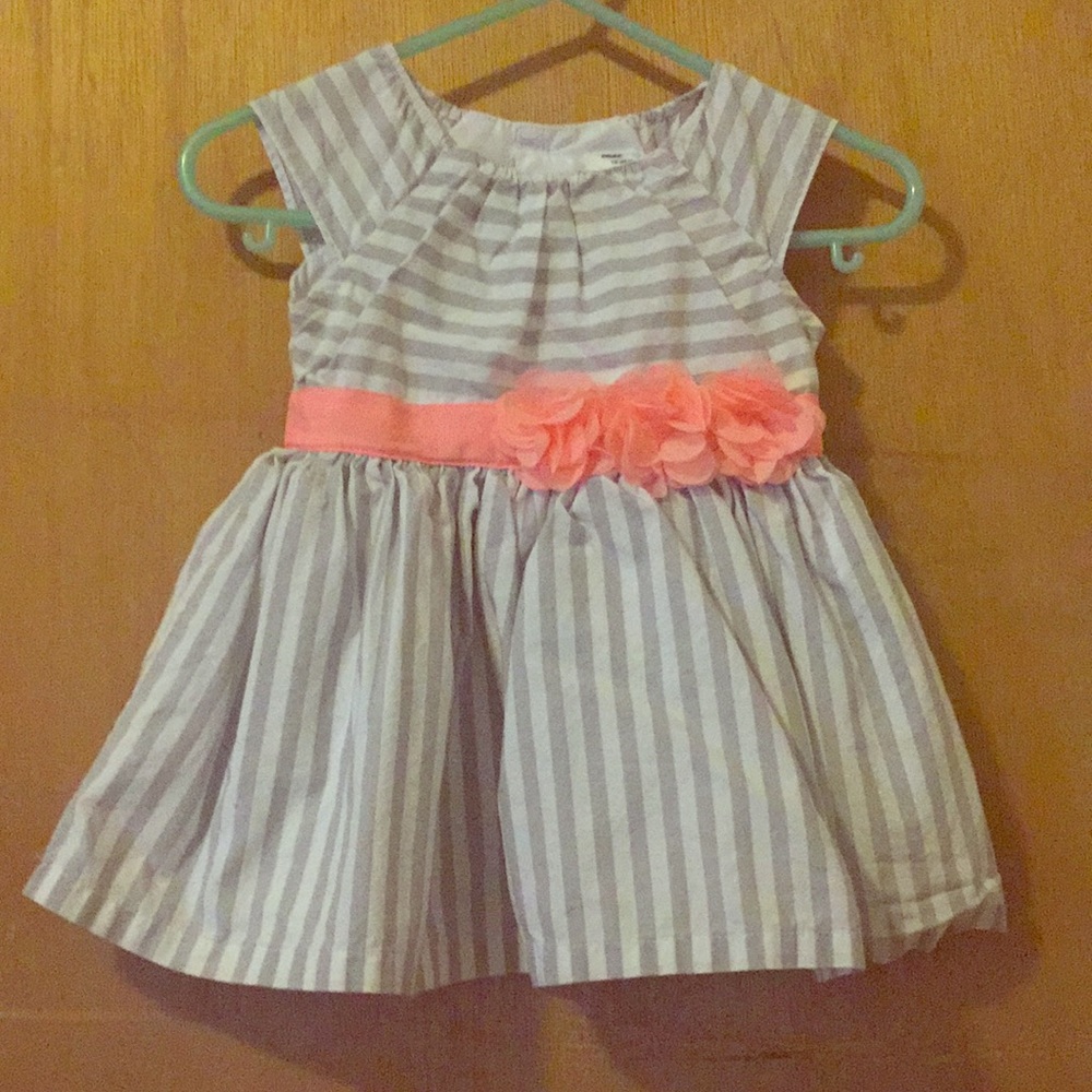 Little girls dress with cute pink flowers